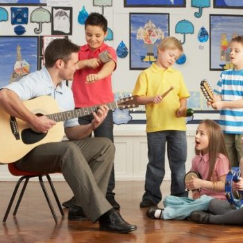 Children listening to live music